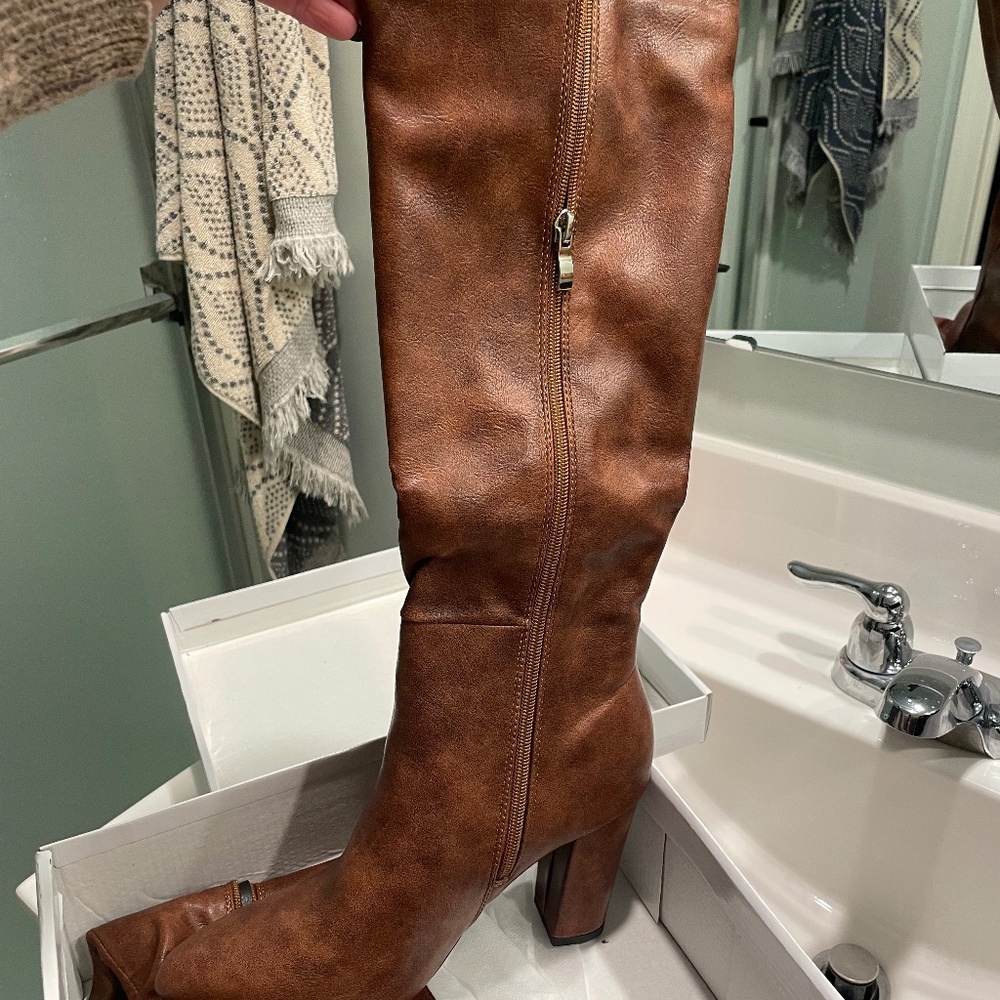 Brown knee high boots